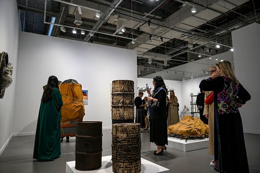 Visitors admiring the works of Bulgarian artist Christo