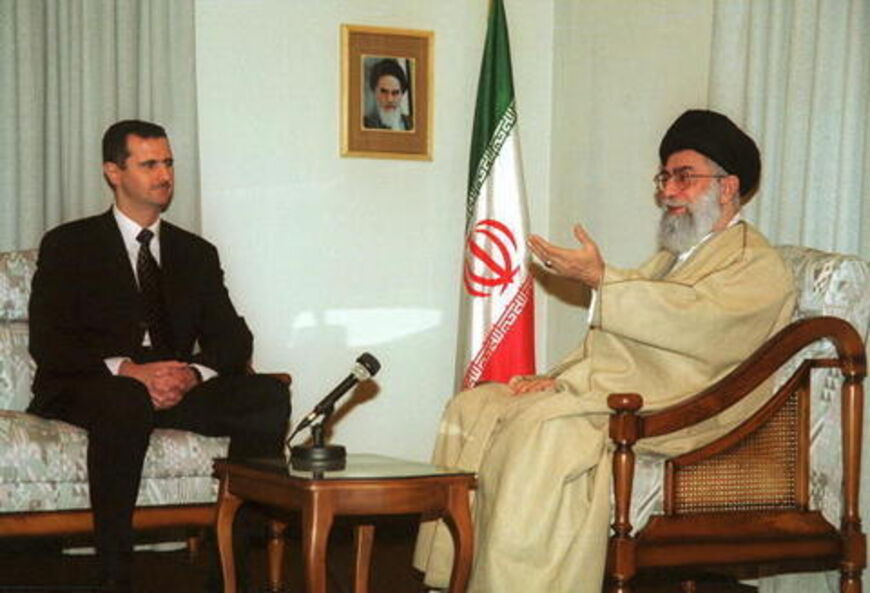 Iran's Supreme Leader Ayatollah Ali Khamenei meets Syrian President Bashar al-Assad in Tehran, January 25, 2001. (ATTA KENARE/AFP via Getty Images)