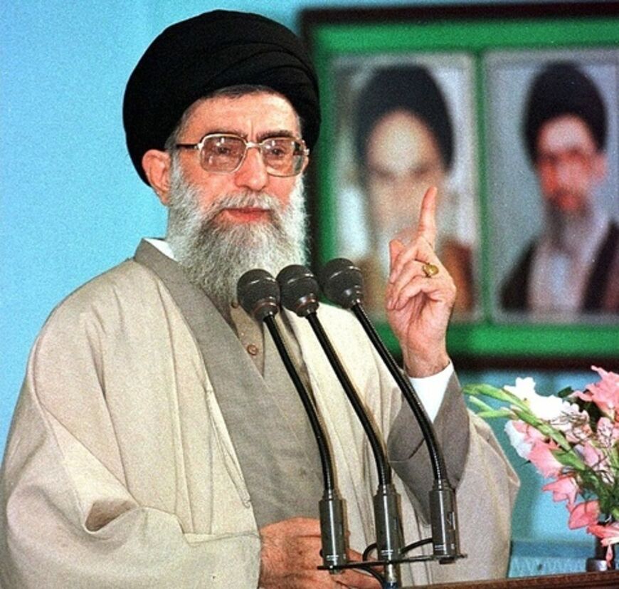 Iran's supreme leader Ayatollah Ali Khamenei addresses Friday mass prayers, 30 October at Tehran University, to mark the 1,000th such ceremonies in the Iranian capital since the 1979 Islamic revolution. Khamenei launched a scathing personal attack against Palestinian leader Yasser Arafat for signing the Wye River agreement with Israel, calling him a "traitor and a lakey of the Zionists." (Photo by Atta KENARE and - / AFP) (Photo by ATTA KENARE/AFP via Getty Images)