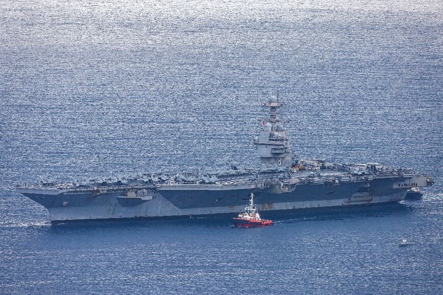The USS Gerald R. Ford arrives at Souda Bay naval base on the island of Crete on March 23, 2026