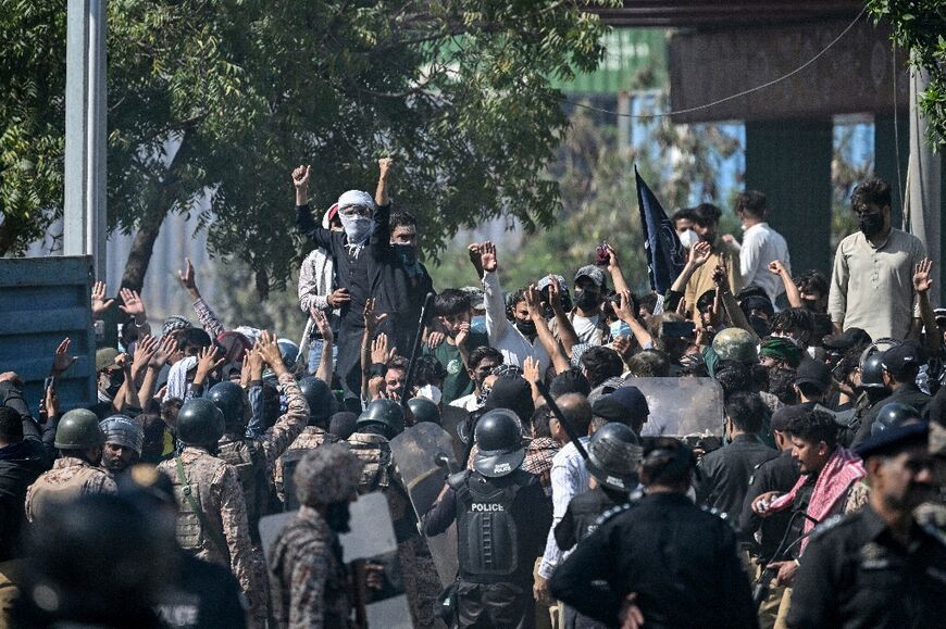 Shiite Muslims shout slogans during a protest outside the US consulate in Karachi on March 1, 2026 