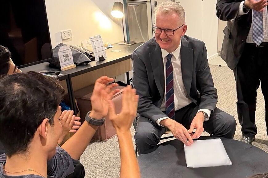 Home Affairs Minister Tony Burke meets with players from Iran's women's football team, who have been offered asylum in Australia. 