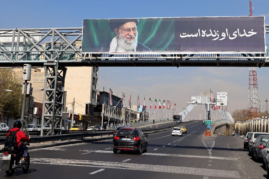 Motorists on an unusually quiet road in Tehran on March 5