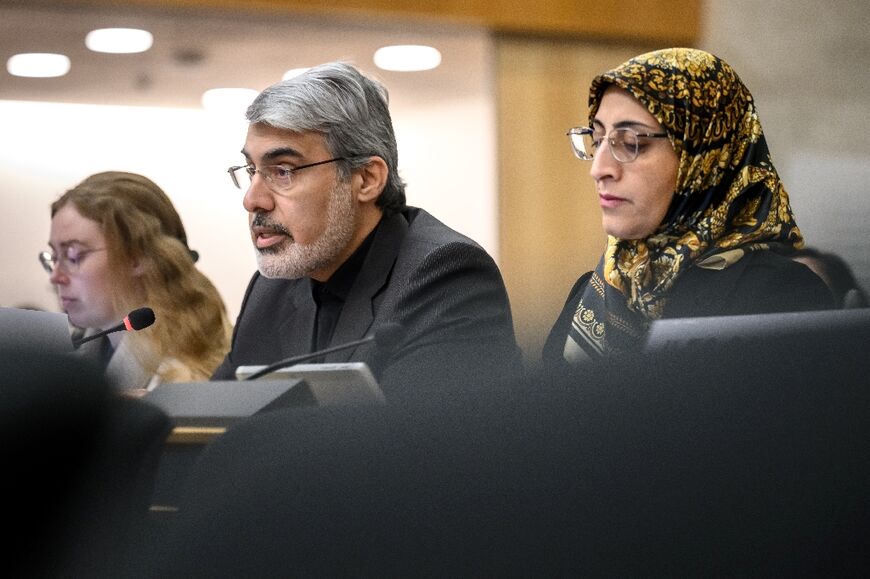 Iran's ambassador Ali Bahreini (C) told the Human Rights Council that his country was under 'reckless military aggression'