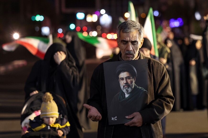 Iranians marched in support of the country's military in capital Tehran, waving Iranian flags and pictures of new supreme leader Mojtaba Khamenei