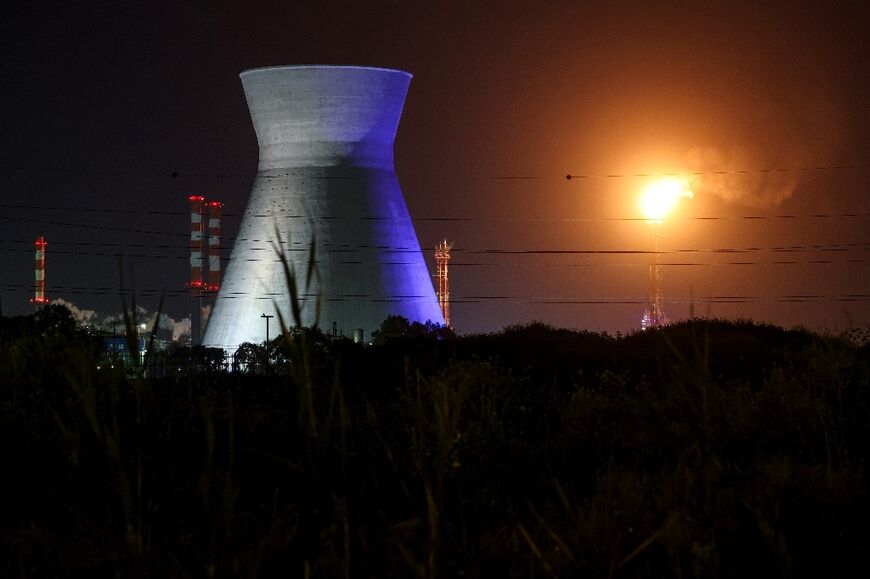 Excess gas is burned at an oil refinery in Israel's northern city of Haifa late on March 19, 2026