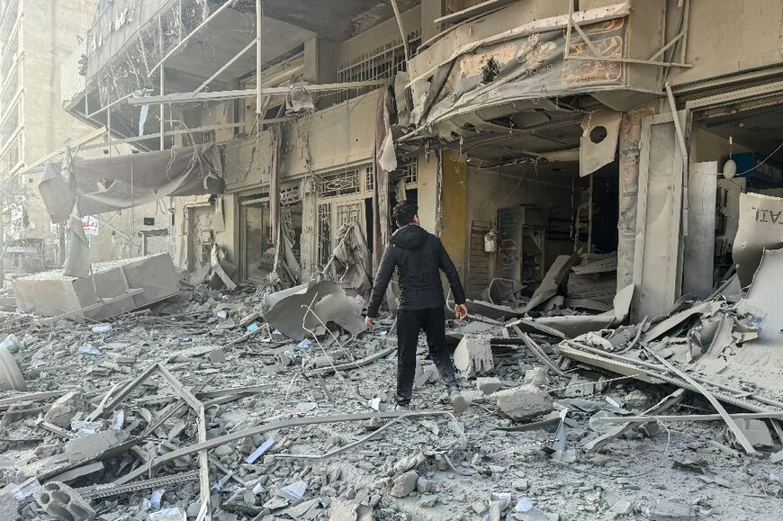 Debris at the site of overnight Israeli airstrikes in the southern suburbs of Beirut