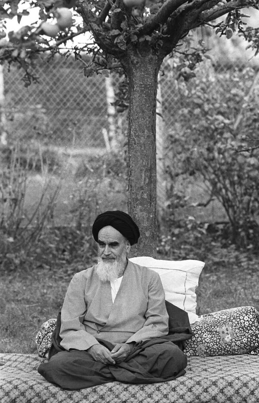 Ayatollah Ruhollah Khomeini in the garden of the villa in  Neauphle-Le-Chateau that was his exile before his triumphant return to Iran