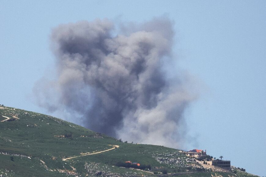 Smoke rises from the site of an Israeli strike that targeted the village of Kfar Tibnit on April 16