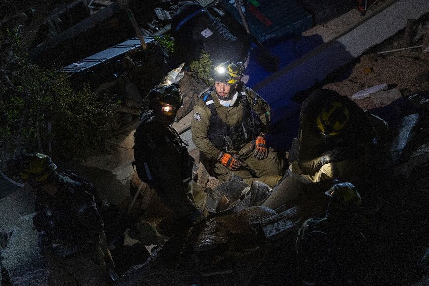 The Israeli military and medics said a missile fired from Iran hit a residential building in the northern city of Haifa