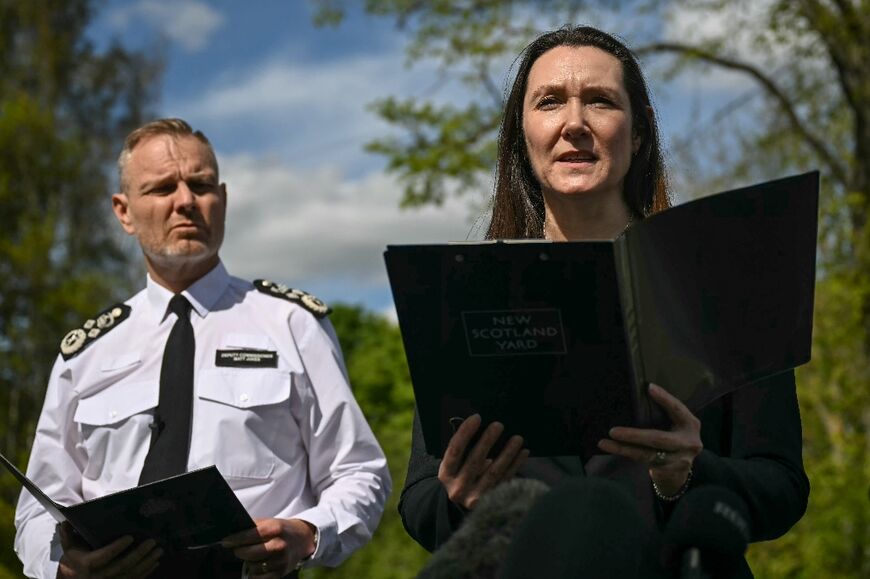 London's Metropolitan Police deputy commissioner Matt Jukes and deputy assistant commissioner Vicki Evans make statements near an area cordoned off by police, after an attack on the the Kenton United Synagogue in Harrow, northwest London 