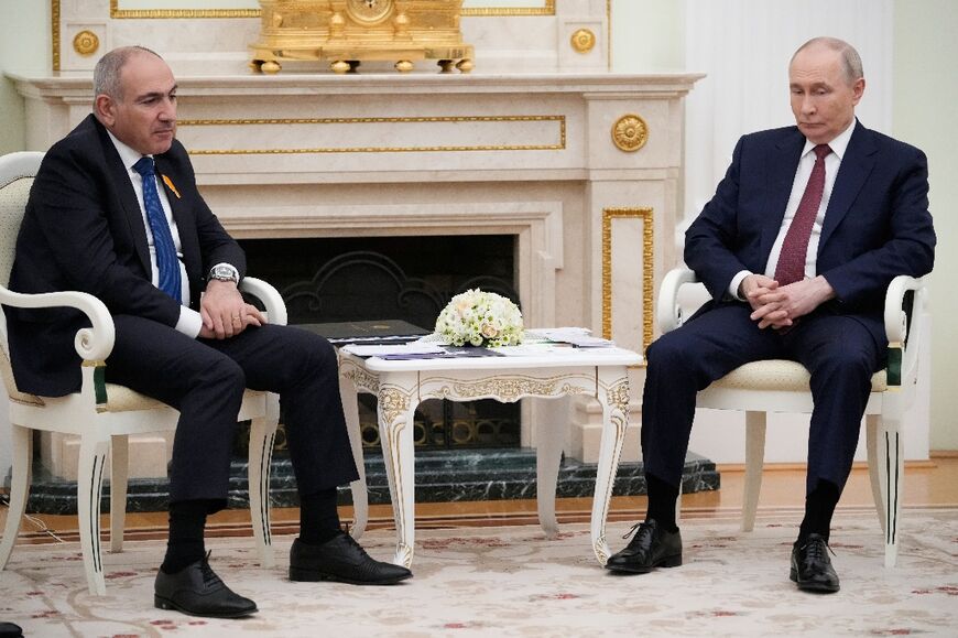 Armenian Prime Minister Nikol Pashinyan -- seen here meeting Vladimir Putin -- has pursued ties with both Russia and the West