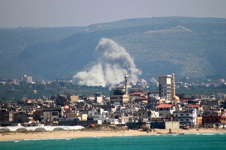 Smoke rising from the site of an Israeli airstrike on the south Lebanon village of El Qlaile