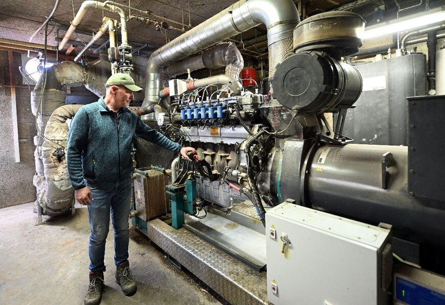 Farmer Gerhard Geywitz has a fermentation plant at his farmstead in Bermaringen, southwestern Germany