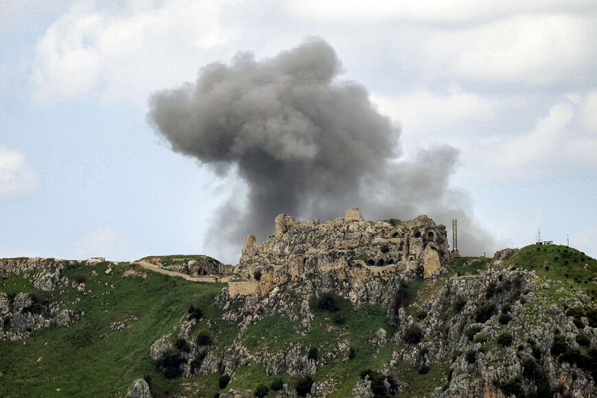 Smoke rises from Israeli bombardment on the village of Yohmor in southern Lebanon behind the 12th century Crusader-era Beaufort (Belfort) Castle, known locally as Qalat al-Shaqif or Shaqif Arnun, as seen from nearby Marjeyoun (Marjayoun) on May 6, 2026. (Photo by AFP via Getty Images)