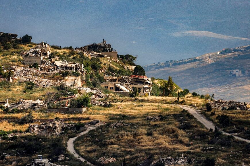 Destroyed buildings are pictured in the village of Odaisseh in southern Lebanon as seen from across the border in the Upper Galilee region of northern Israel on May 29
