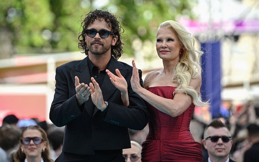 Finland's Linda Lampenius (R) and Pete Parkkonen, with the song 'Liekinheitin', are hotly tipped to do well at Eurovision