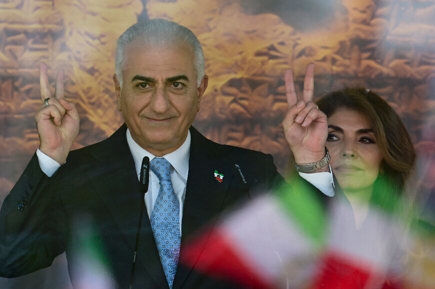 The son of Iran's last shah, Reza Pahlavi attended a rally of supporters with his wife, Yasmine Pahlavi 