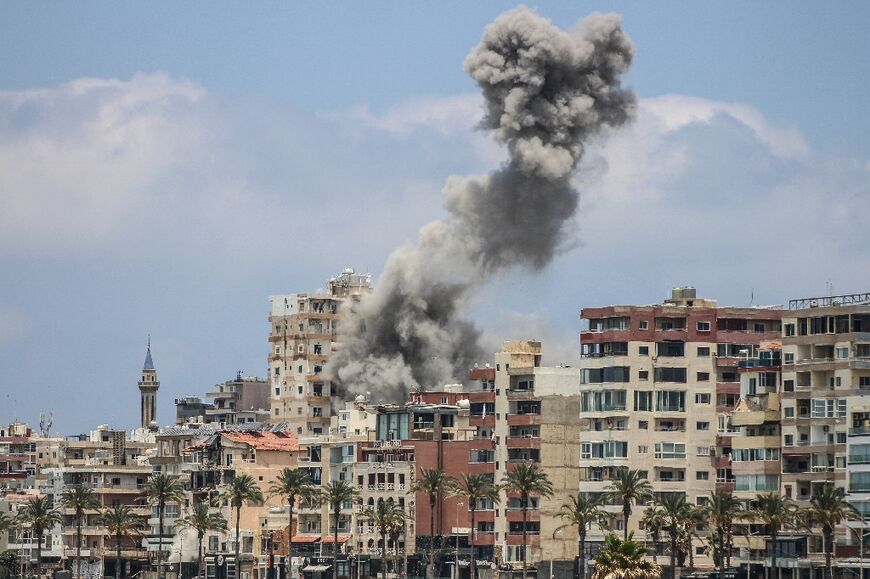 Smoke rises following an Israeli airstrike in Tyre 