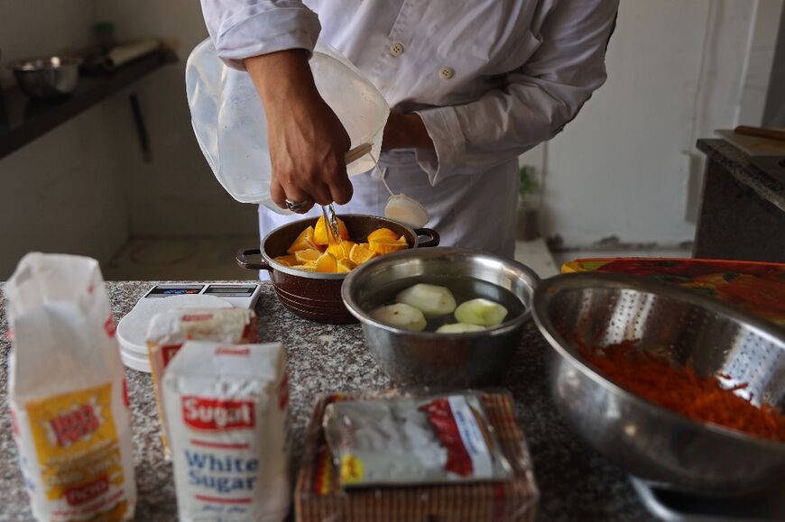 Palestinian youth learn to cook at the Smile Kitchen Academy, in the Rimal neighborhood of Gaza City