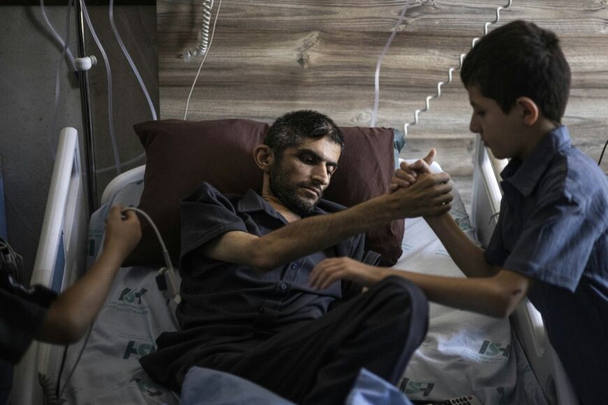 "I was assaulted inside my home in front of my children," Mujahed Bani Mufleh says
