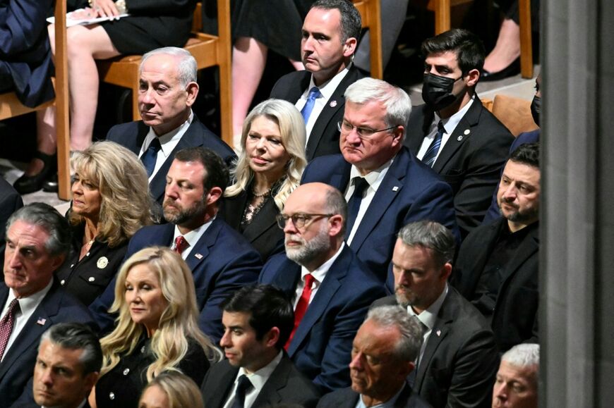 Israli Prime Minister Benjamin Netanyahu (upper L) and Ukrainian President Volodymyr Zelensky (R) attend the funeral service for US Senator Lindsey Graham at the Washington National Cathedral in Washington, DC