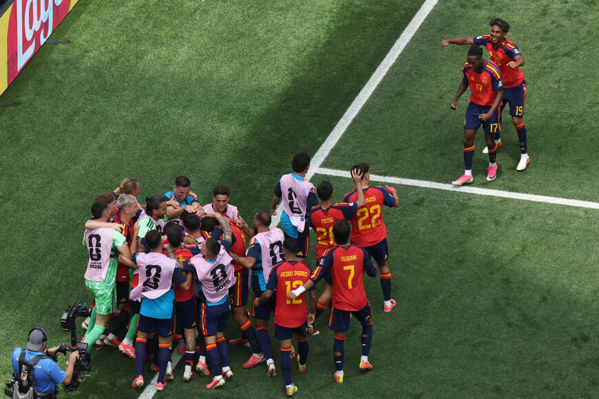 Spain's midfielder #06 Mikel Merino celebrates scoring his team's second goal with teammates during the 2026 World Cup football tournament quarter-final match between Spain and Belgium at the Los Angeles Stadium in Inglewood on July 10, 2026. (Photo by VALERIE MACON / AFP via Getty Images)