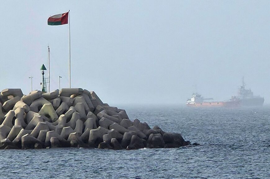 Iran and Oman are discussing a joint temporary navigational corridor through the Strait of Hormuz