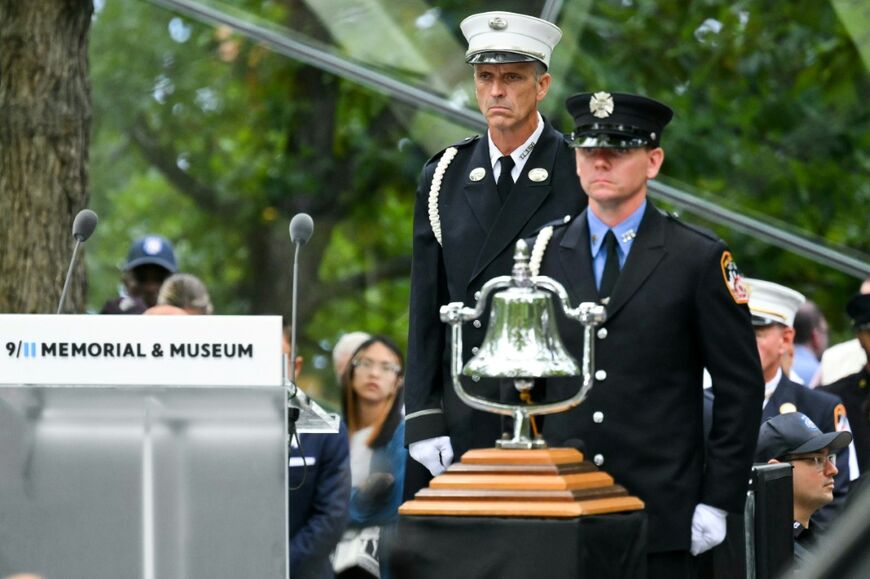 Along with the roll call of 9/11 victims, a bell is rung to mark the key moments in the attack