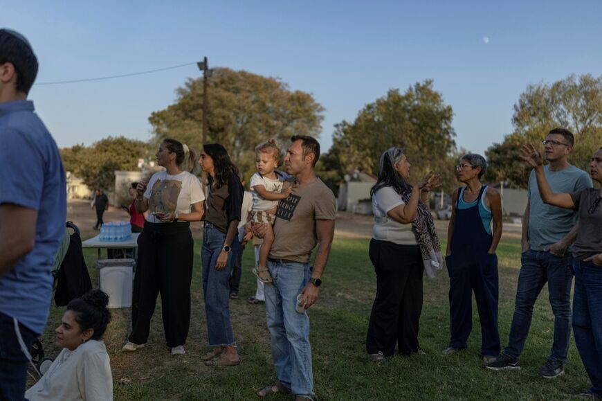 Israelis attend a cornerstone laying ceremony for the building of a new neighbourhood at the Nahal Oz kibbutz