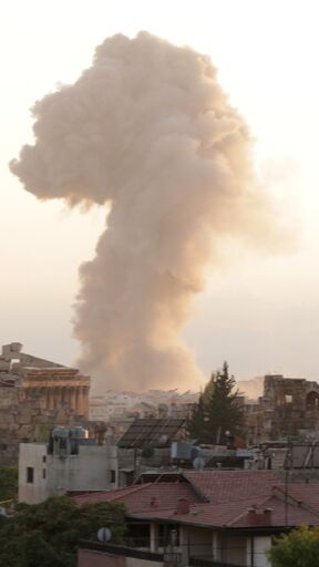 Smoke billows from the site of an Israeli airstrike on the Lebanese city of Baalbeck in the Bekaa Valley