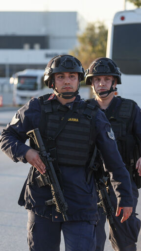 ANKARA, TURKEY - OCTOBER 23: Turkish Jandarma stand guard at the entrance to the Turkish Aerospace Industries facility following an attack on October 23, 2024 in Ankara, Turkey. An attack occurred at the Turkish Aerospace Industries facility in Ankara, with preliminary reports suggesting two attackers detonated an explosive device and opened fire at the entrance gate of the facility. (Photo by Serdar Ozsoy/Getty Images)